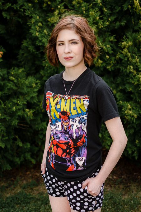 high school senior with x-men shirt