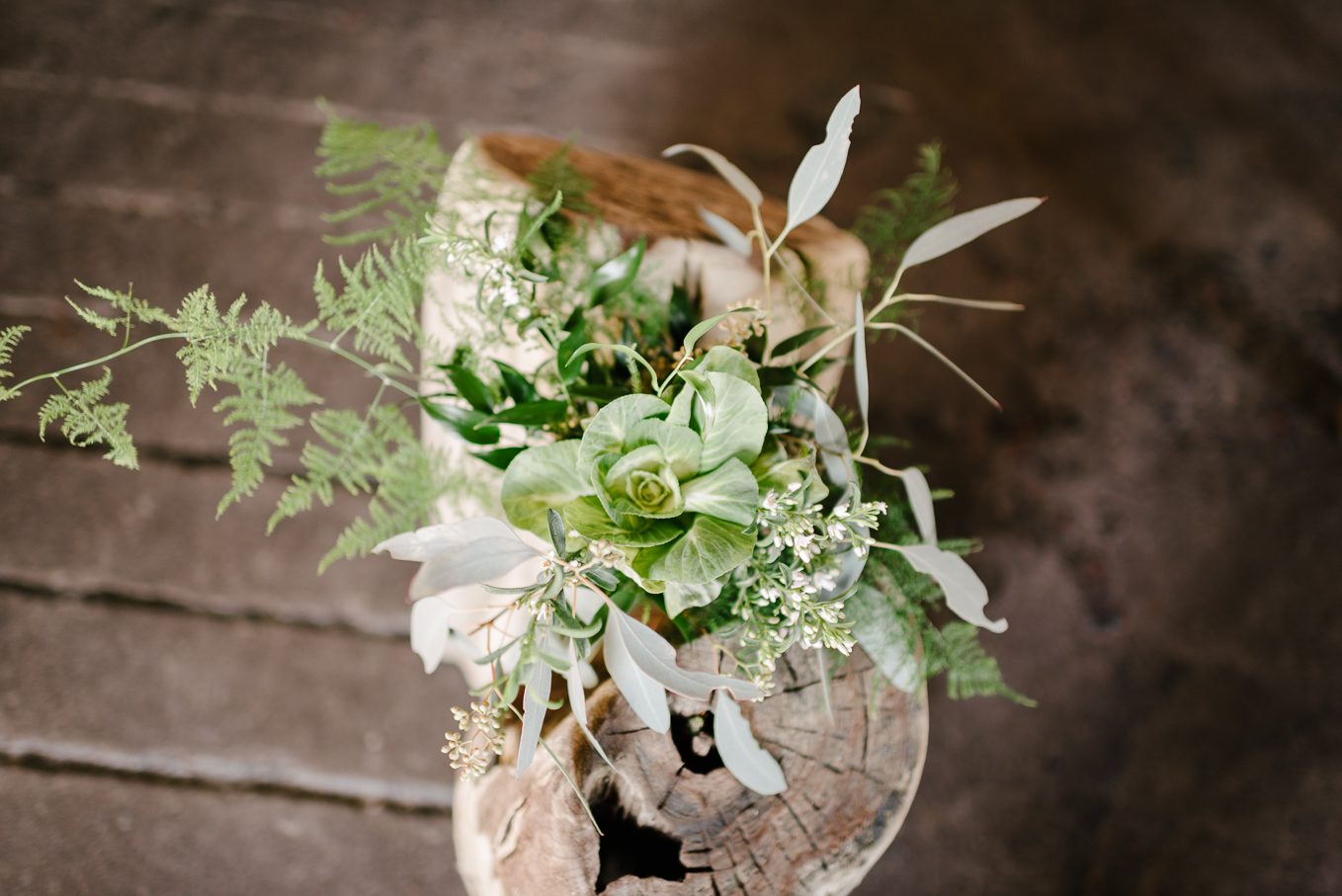cabbage in floral bouquet by wild apples
