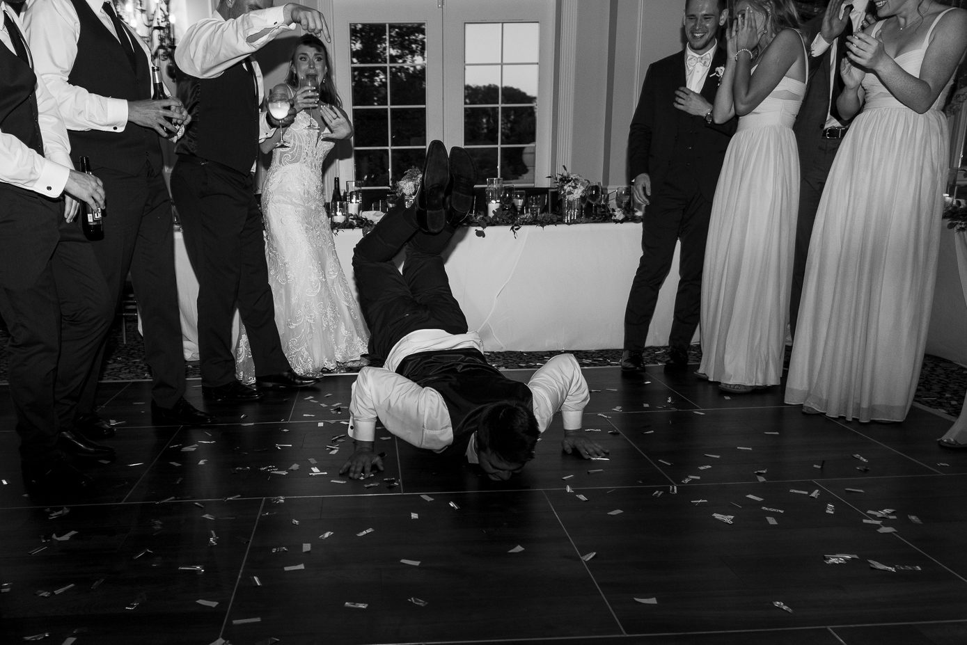 Chicago groom breakdancing on dance floor