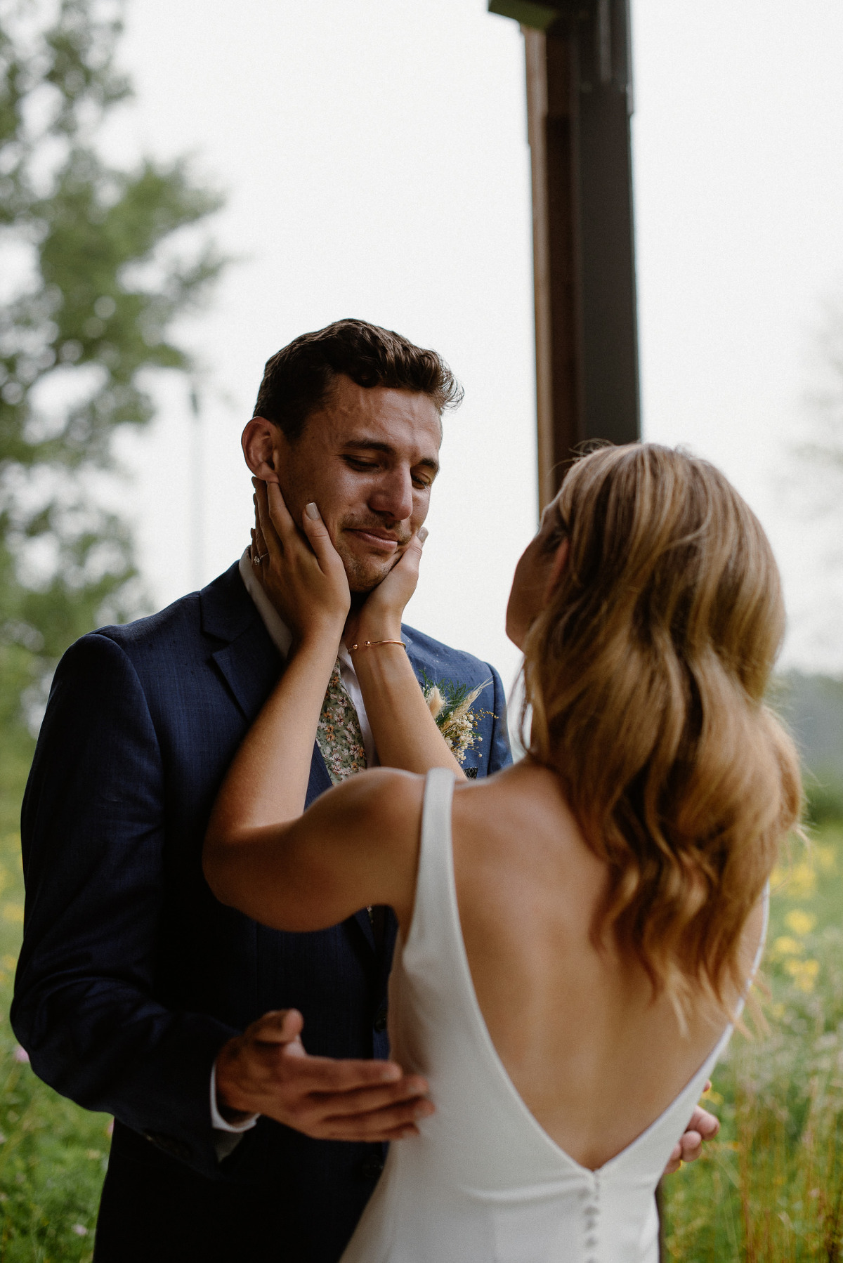Groom crying during first look