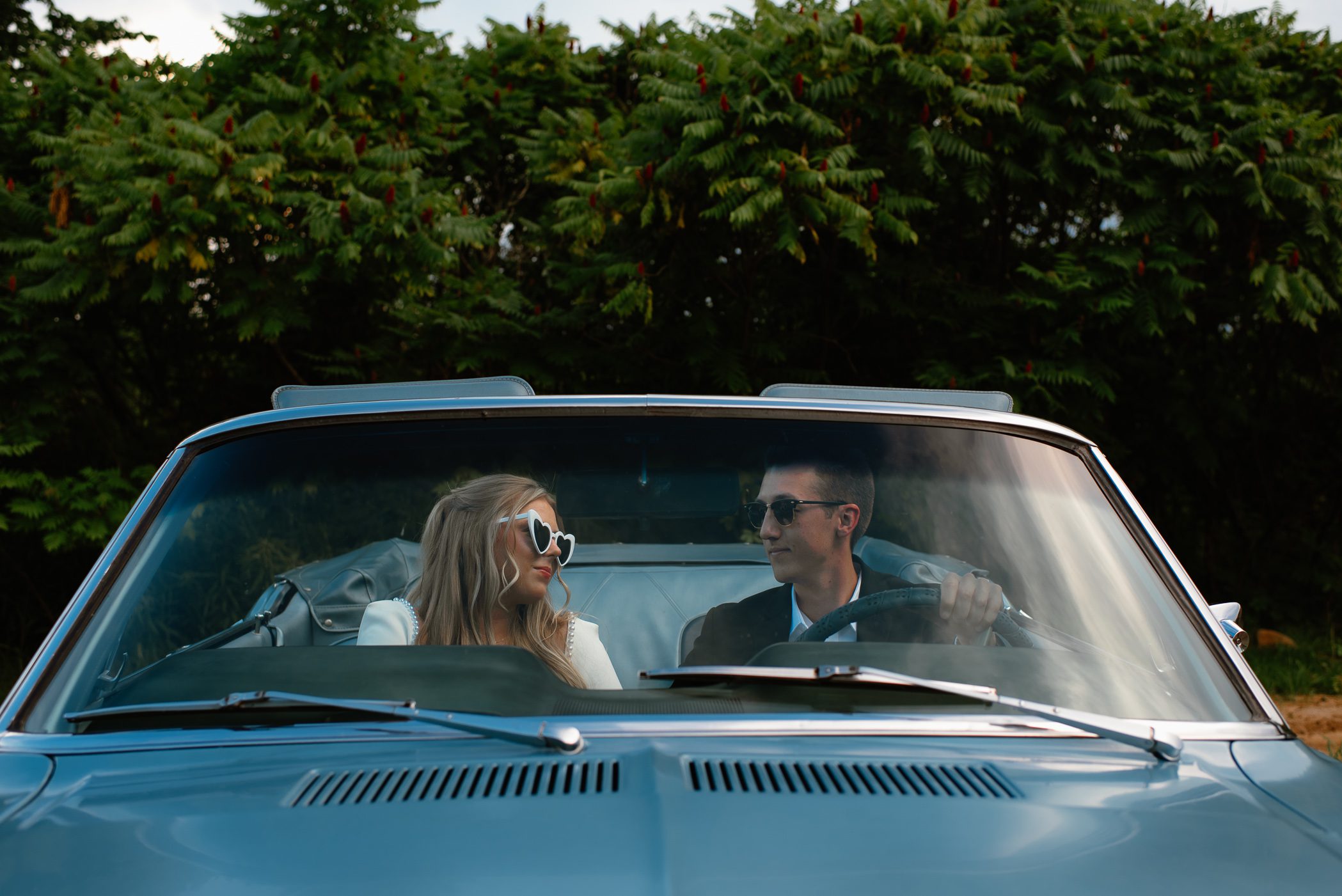 wisconsin editorial engagement session with blue classic mustang car