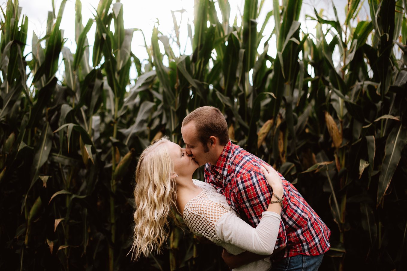 Kiss in Wisconsin corn field.