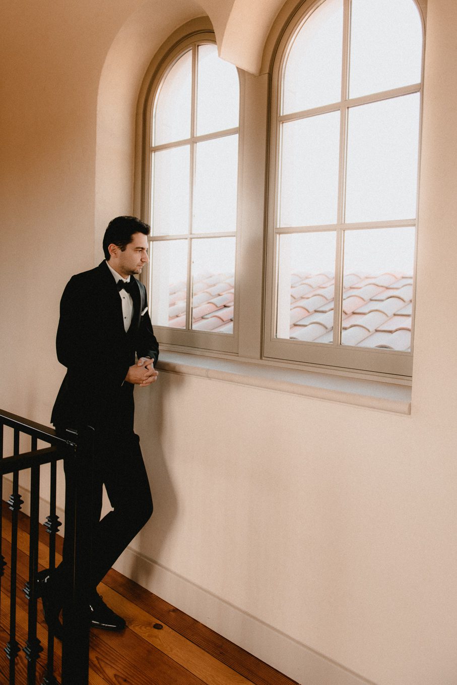 Groom prepairing for first look.