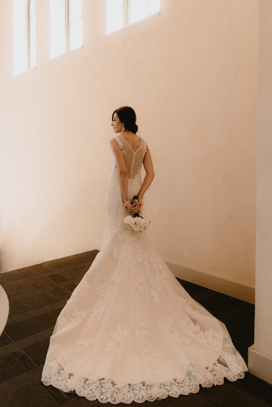Bride in her wedding gown from Vera's.