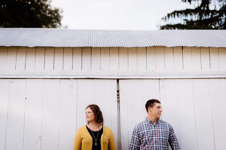 picture of couple next to shed