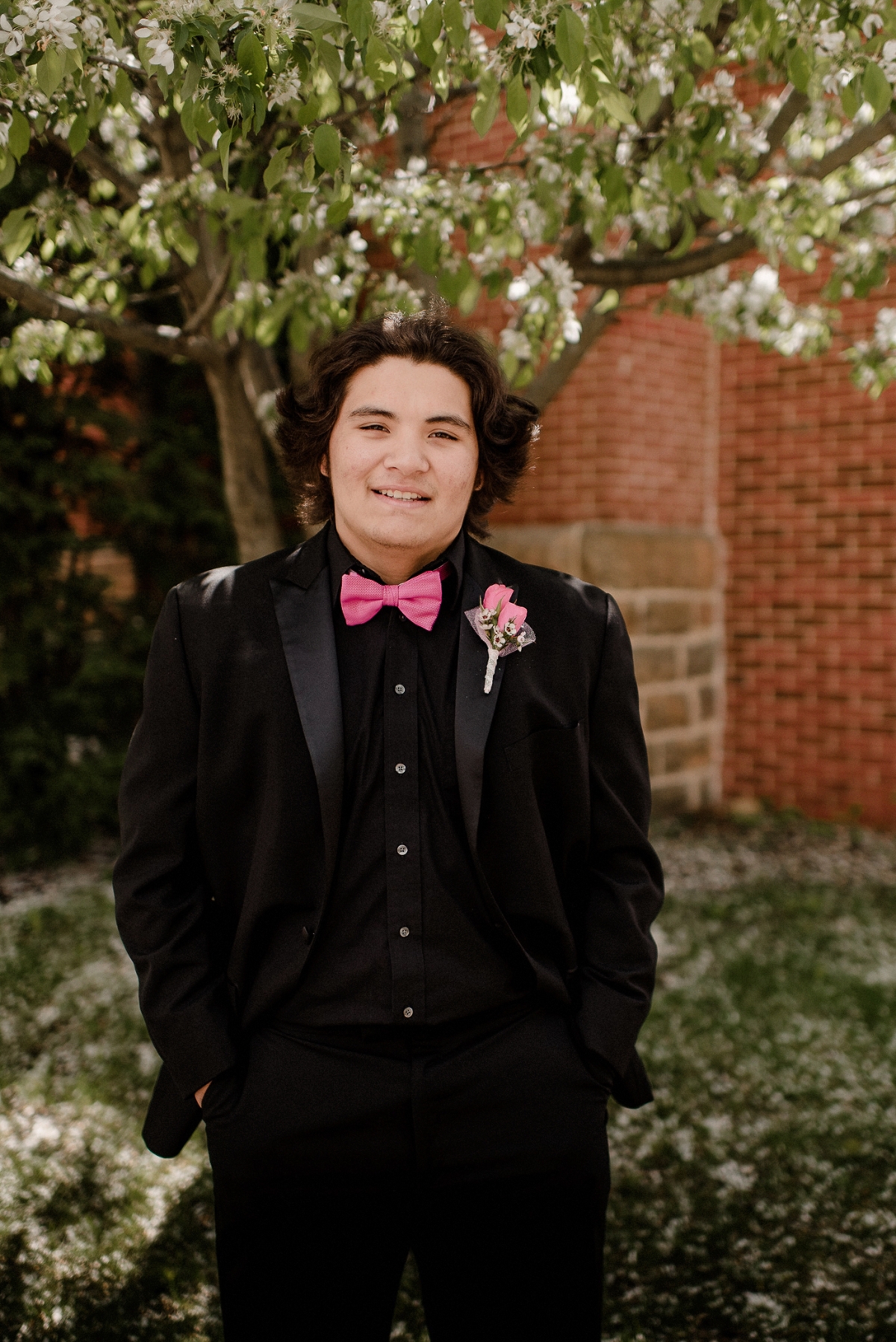 all black tuxedo with pink tie