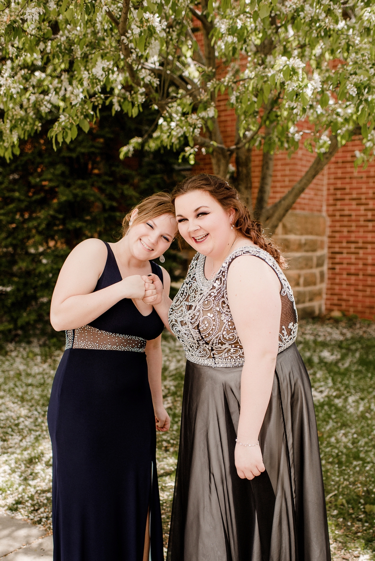 Girlfriends celebrate prom with fist bump