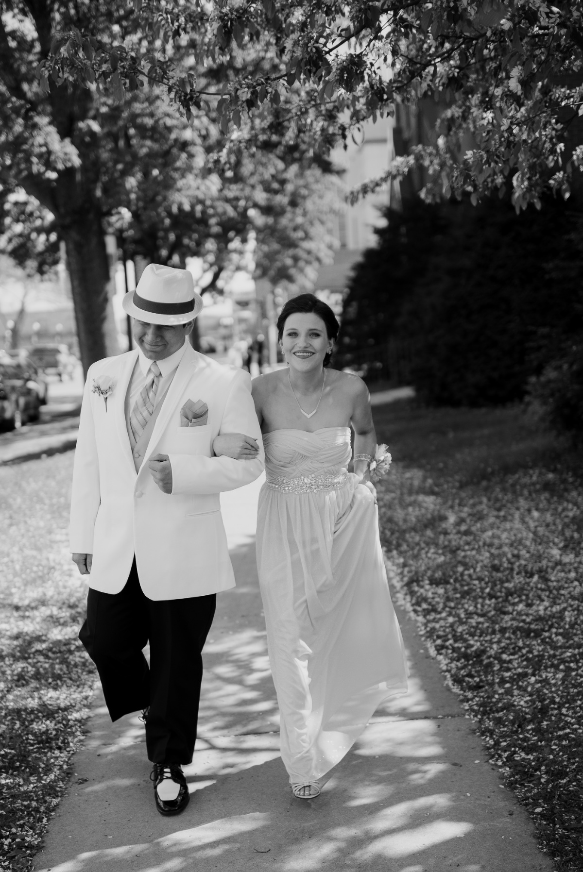 Black and white porm portrait of couple outside Al Ringling Mansion