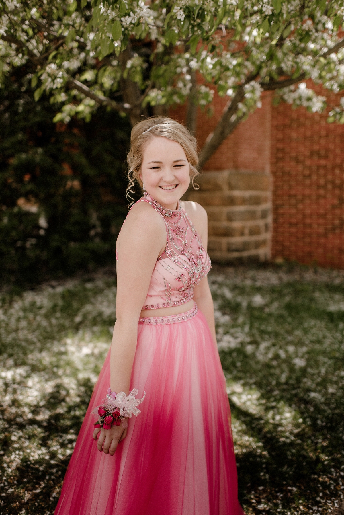 Premiere Couture pink and intricate beaded prom gown