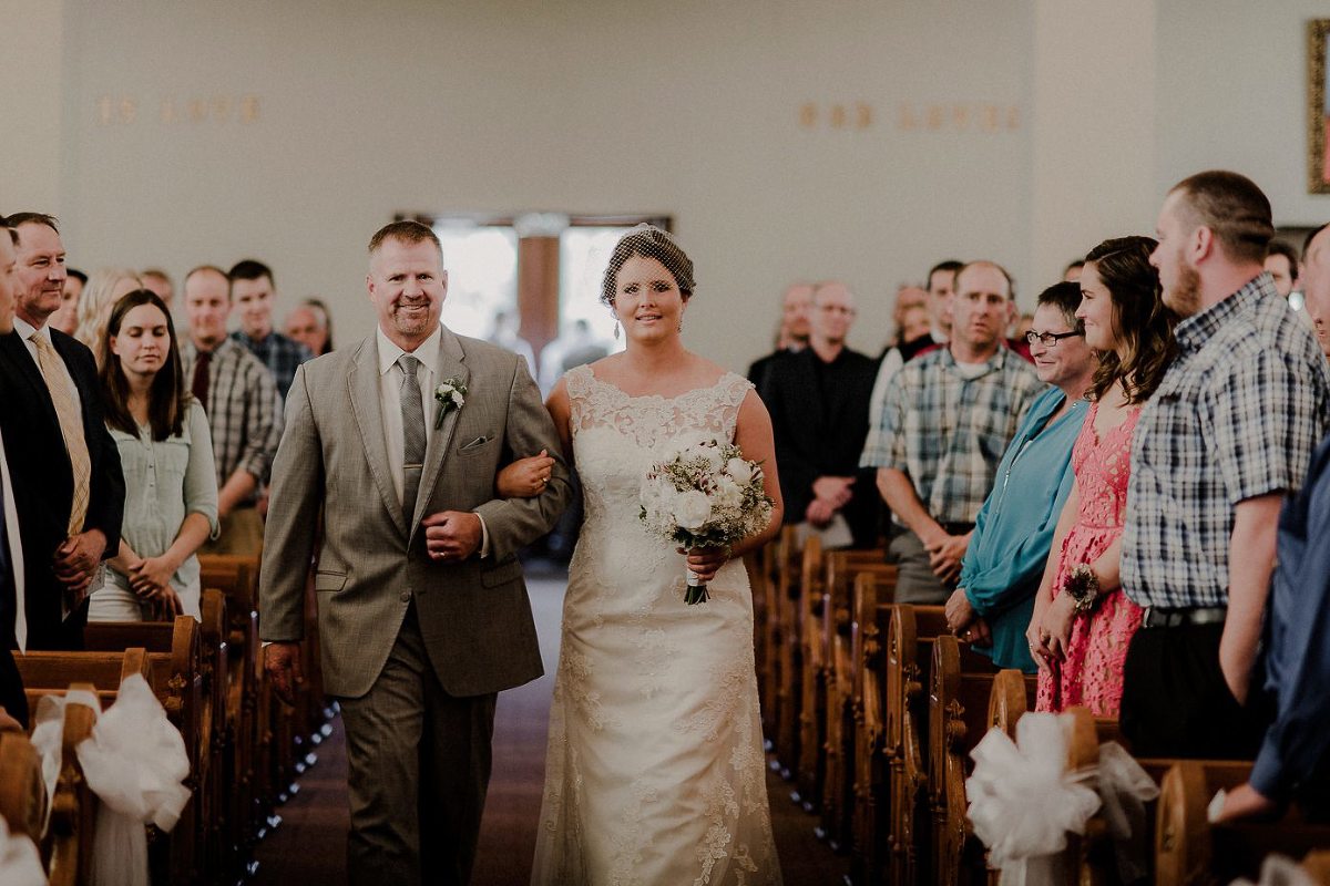 Wisconsin bride walking down the aisle