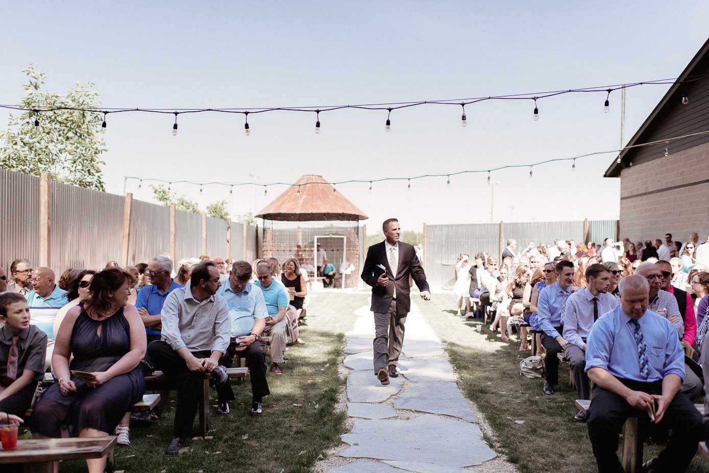 Wedding officiant walking down the aisle