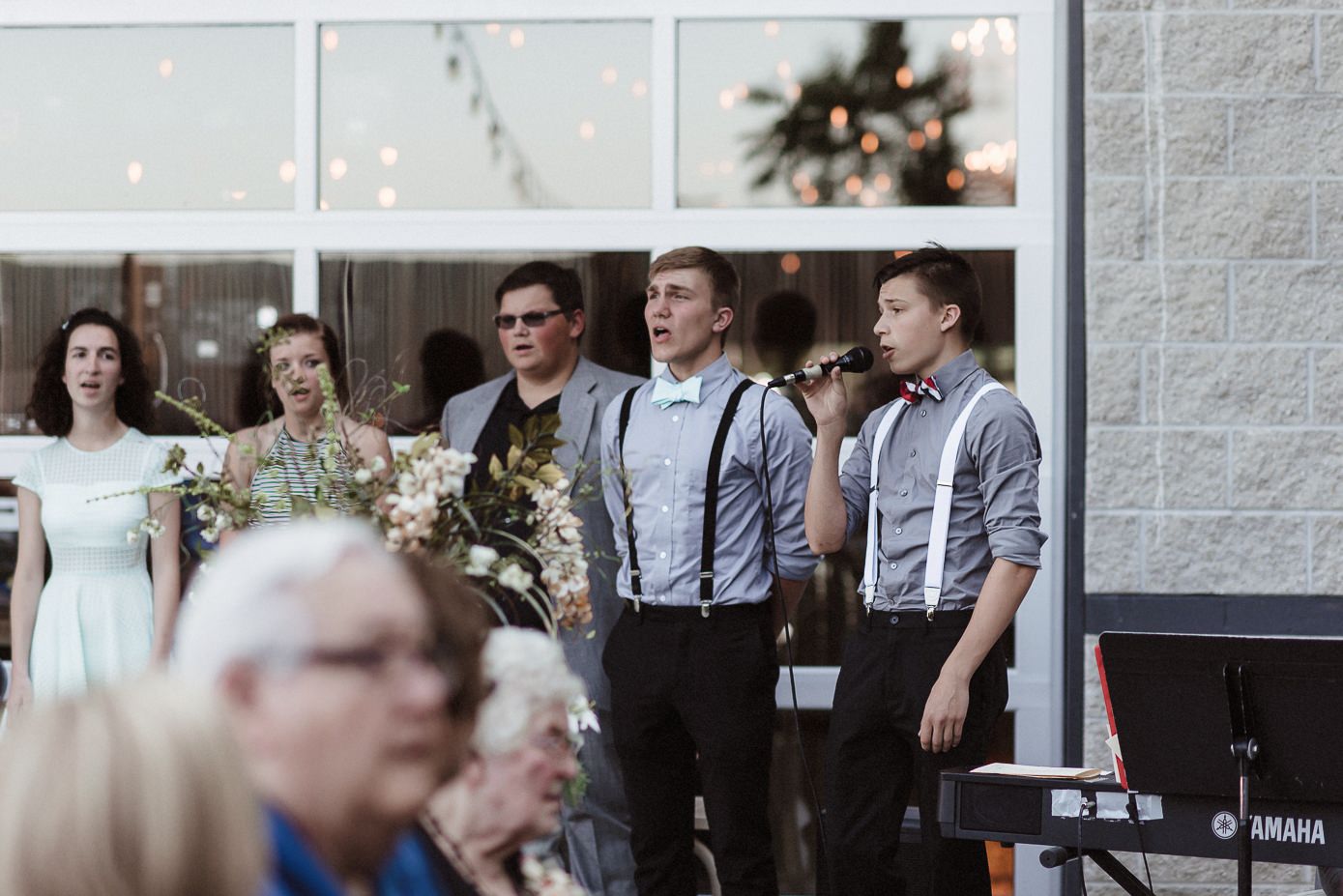 Choir singing final song at wedding ceremony