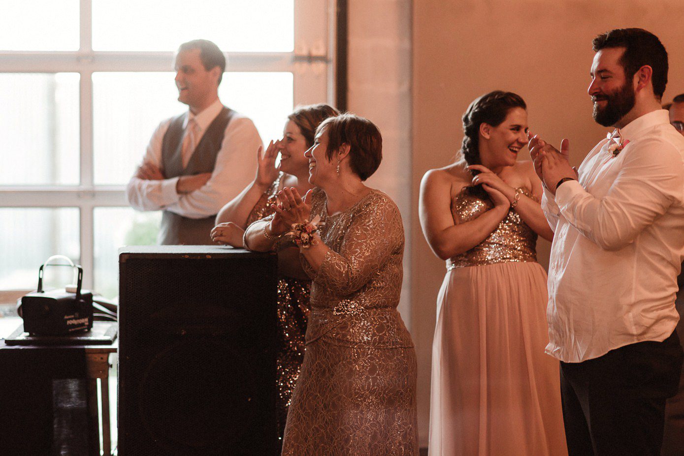 Wedding guests laughing