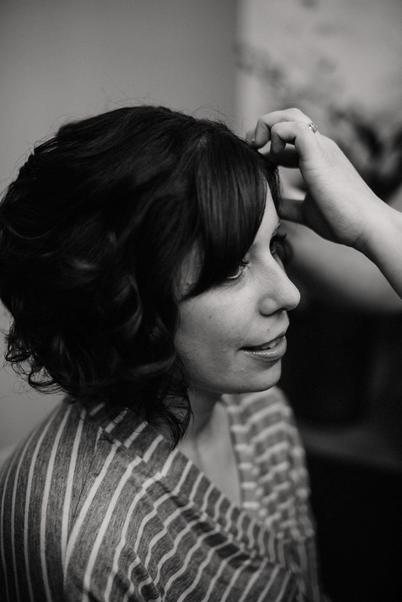 Bride getting her hair done