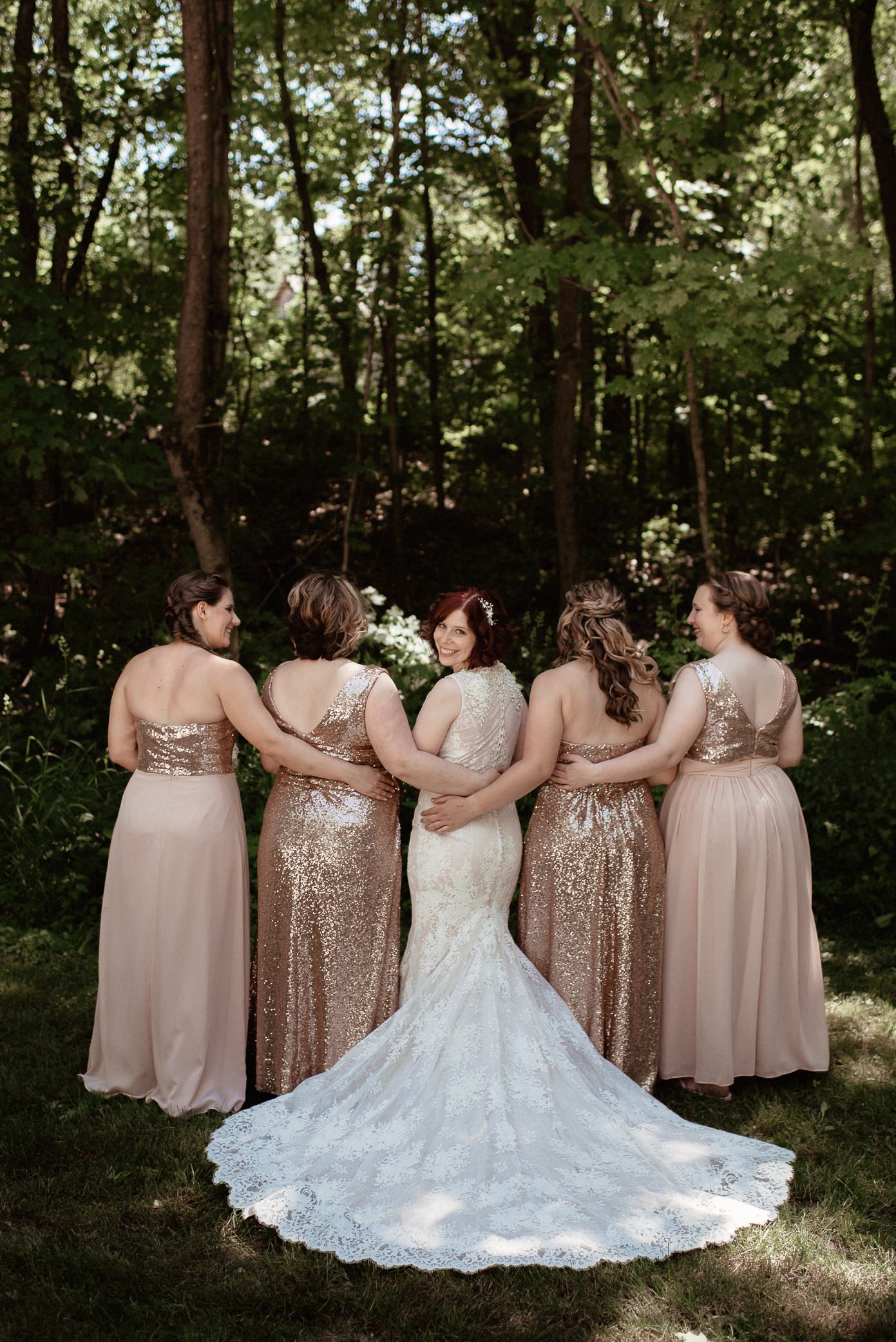 Bride and her bridesmaids with dresses from Amelishan Bridal