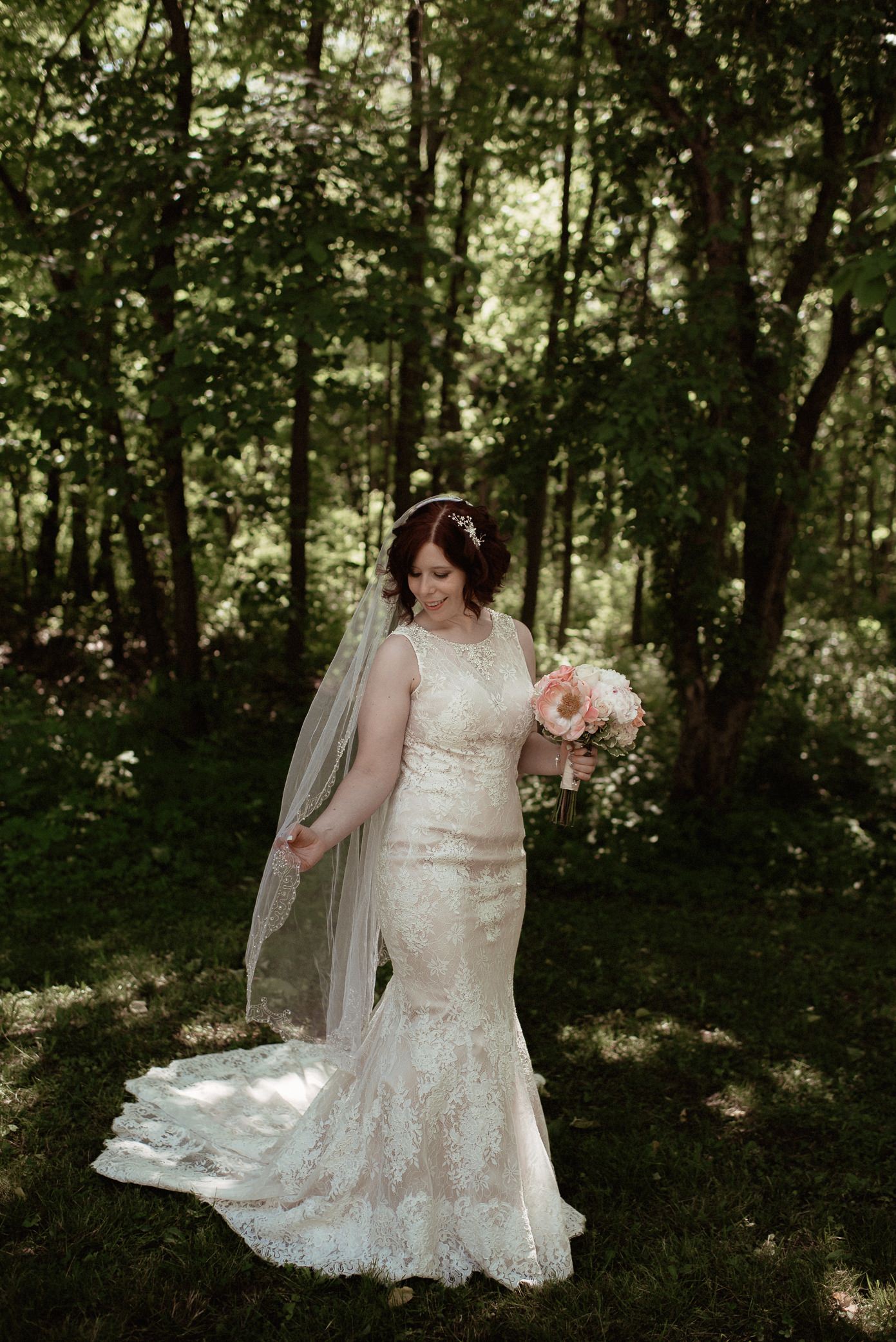 Bride with her Amelishan bridal gown and veil