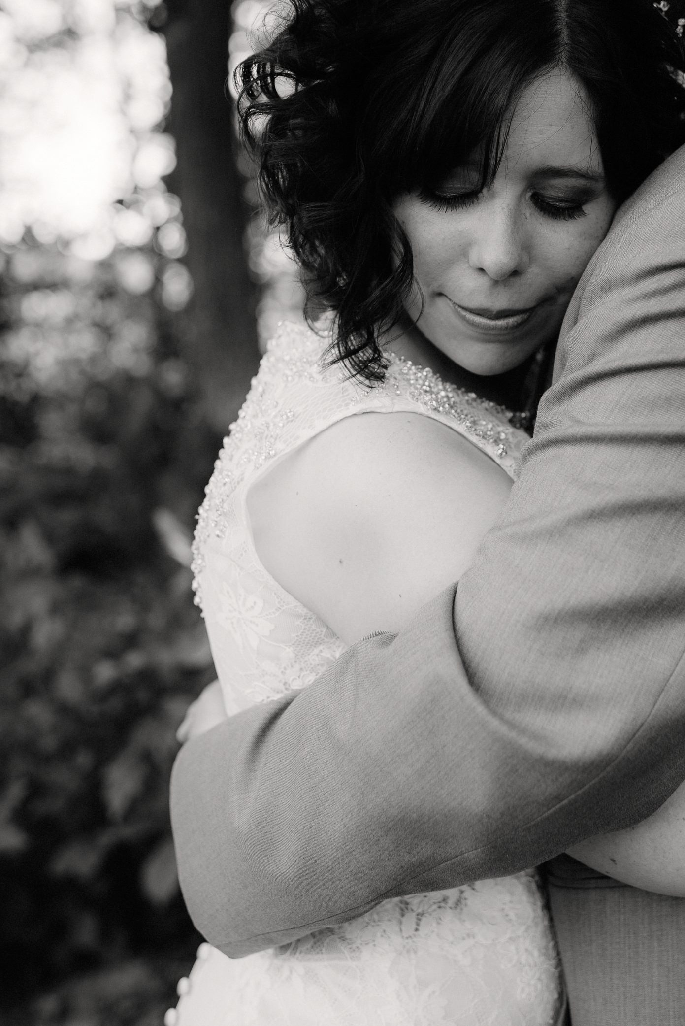 Black and white portrait of couple embracing