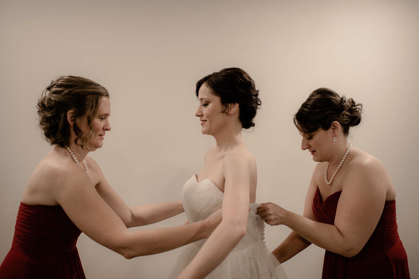 Bride getting into her dress from Vera's bridal