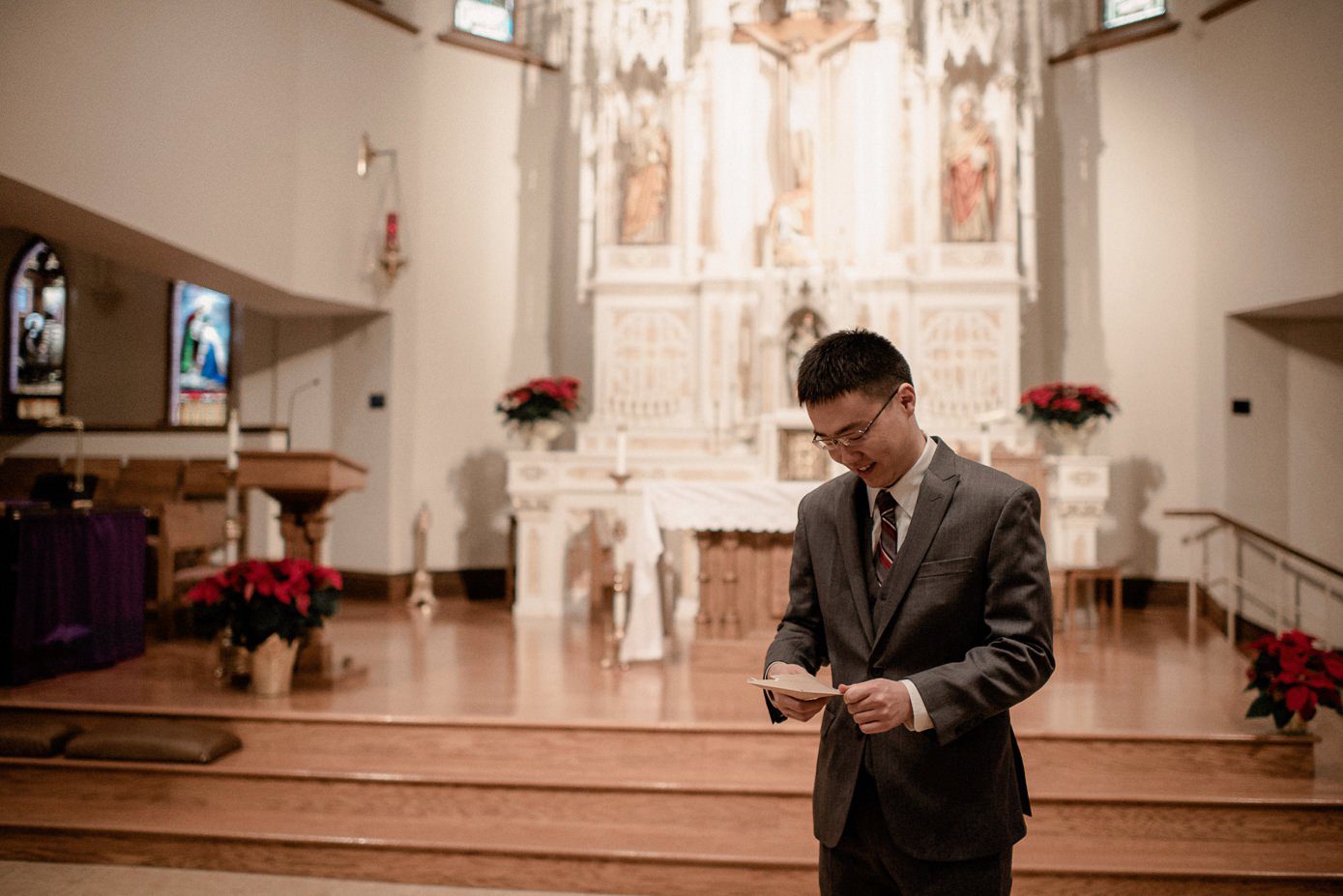 Groom reading letter from his bride