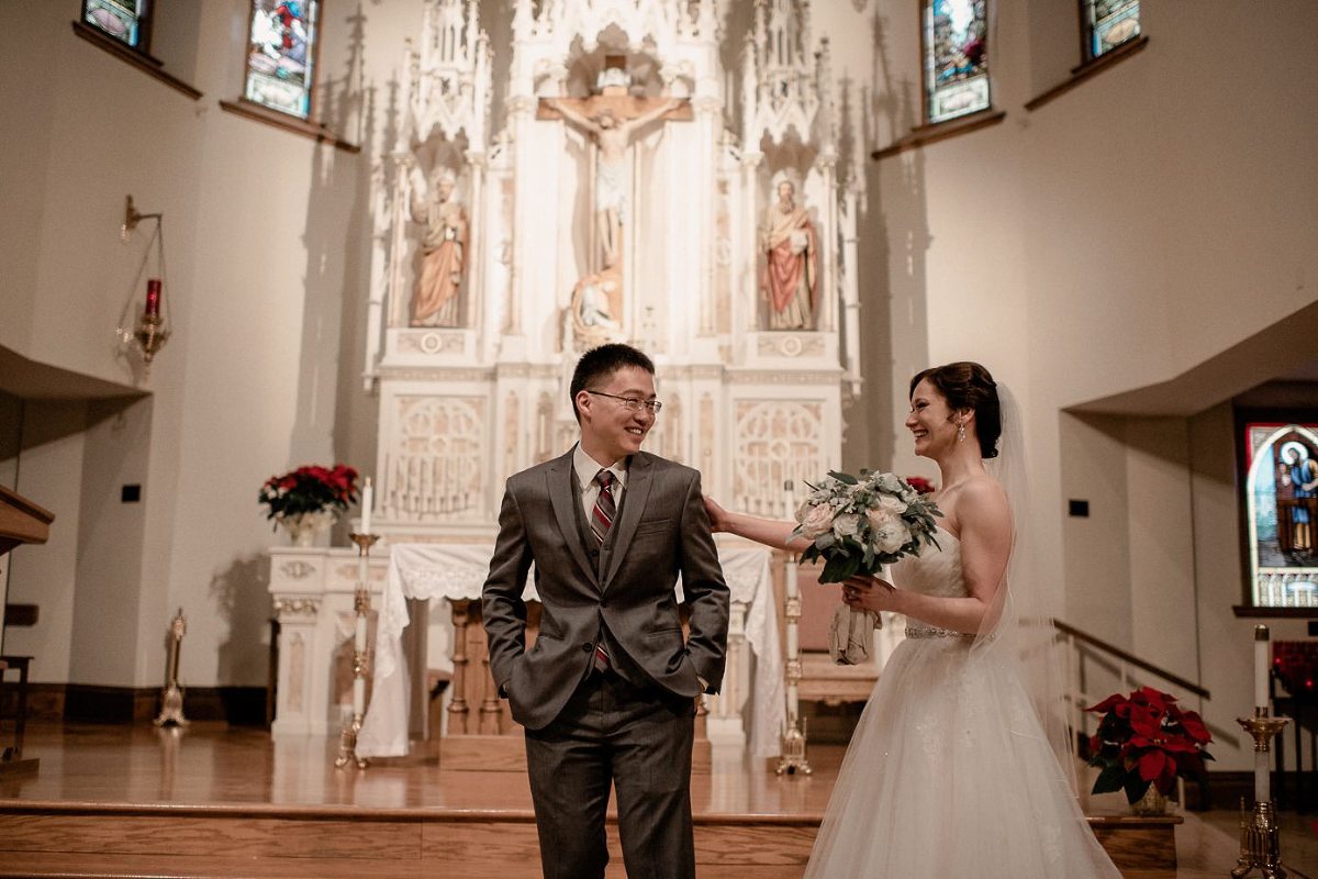 Groom seeing his bride for the first time during first look