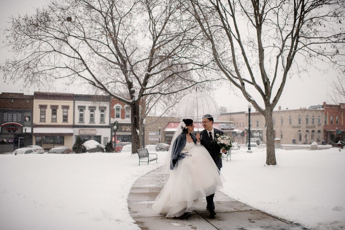 Wedding couple walking to the Baraboo court house