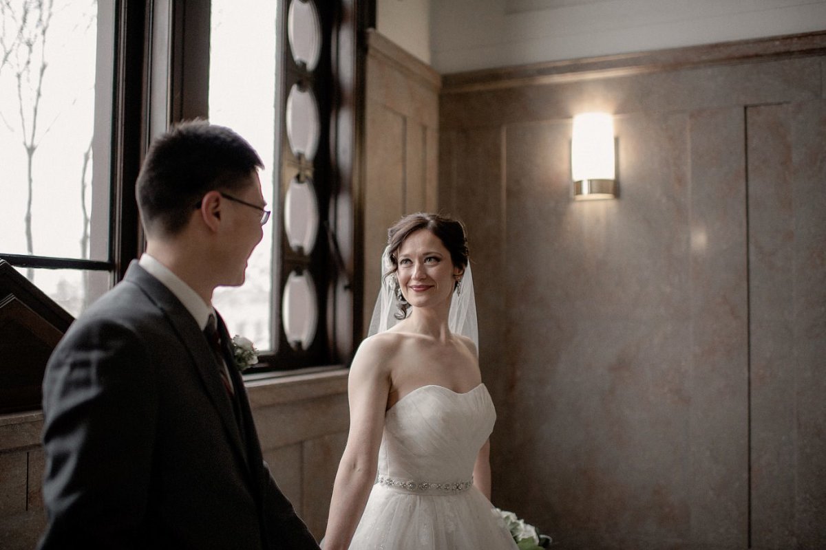 Groom looking at bride in Baraboo Court House