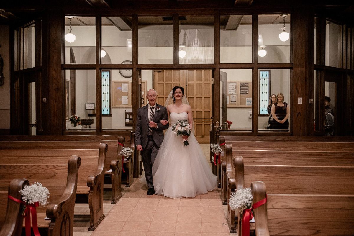Bride walking down the aisle with her father