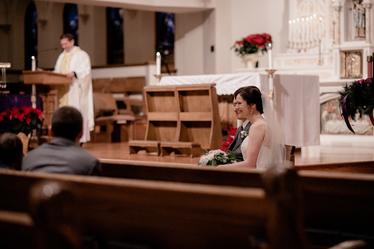 Bride smiling during wedding ceremony