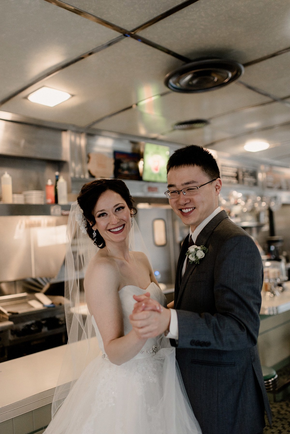 Wisconsin bride dancing in Broadway Diner
