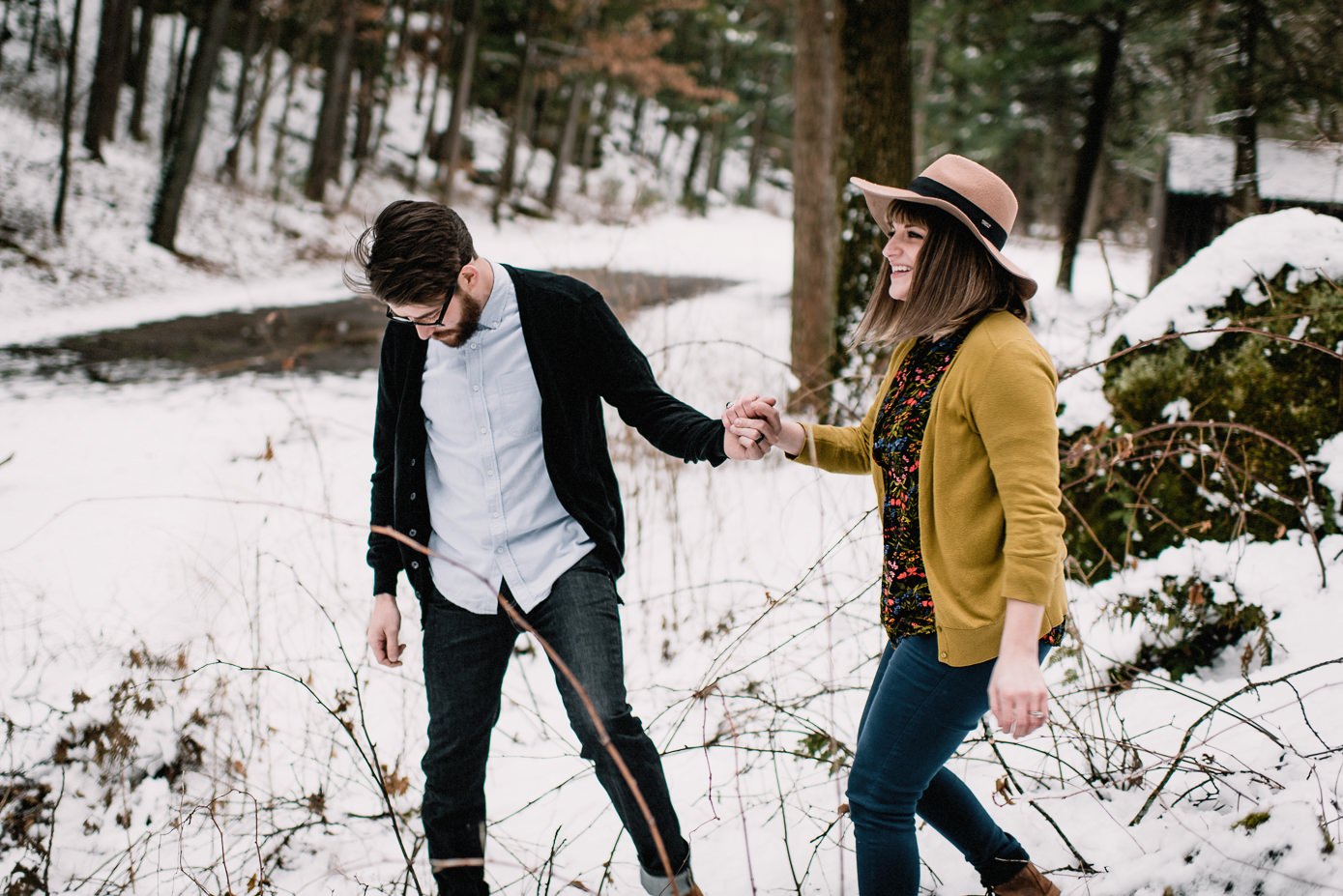 couple walking hand in hand at Rocky Arbor WI Dells