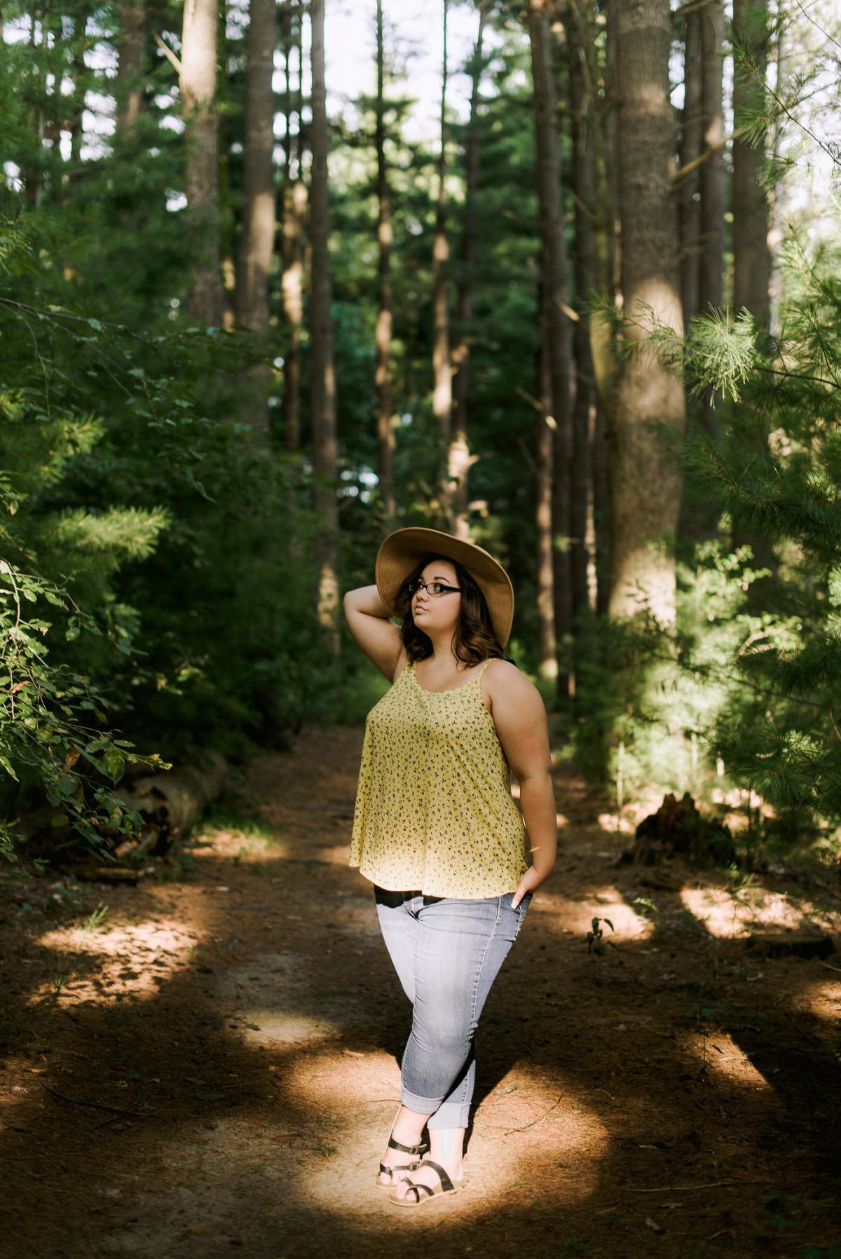 Poynette senior pictures in pine tress