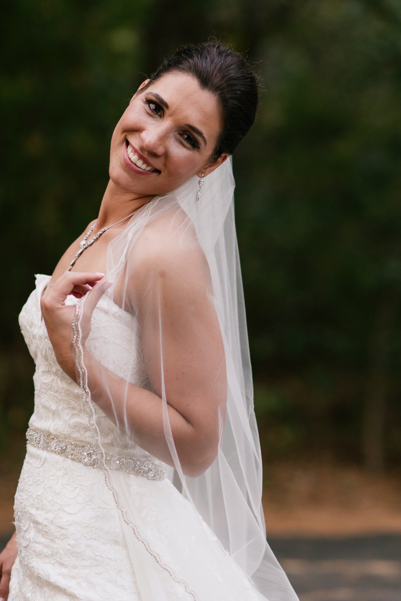 Bride smiling during sunset portraits