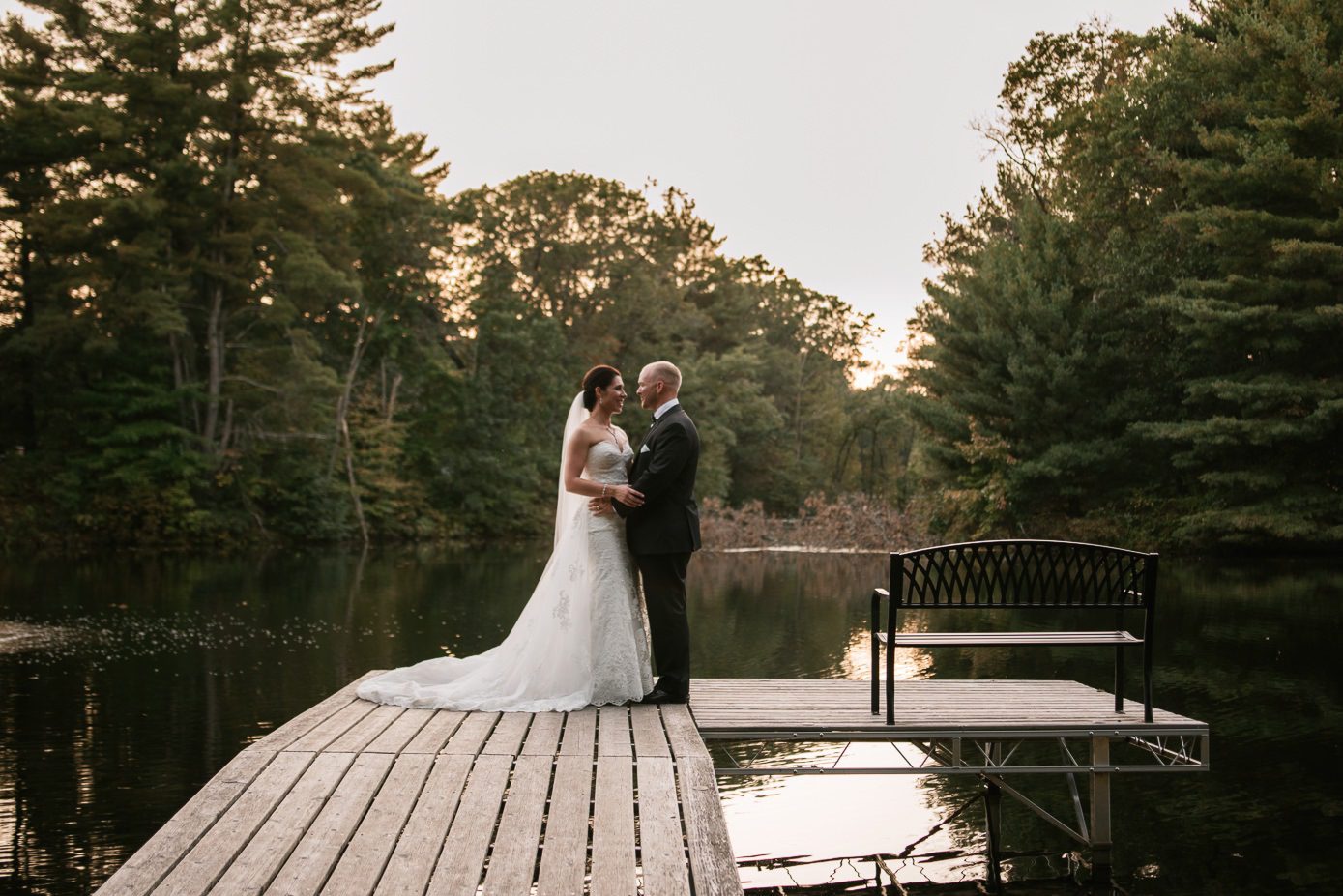 Sunset wedding photos on dock in Wisconsin Dells
