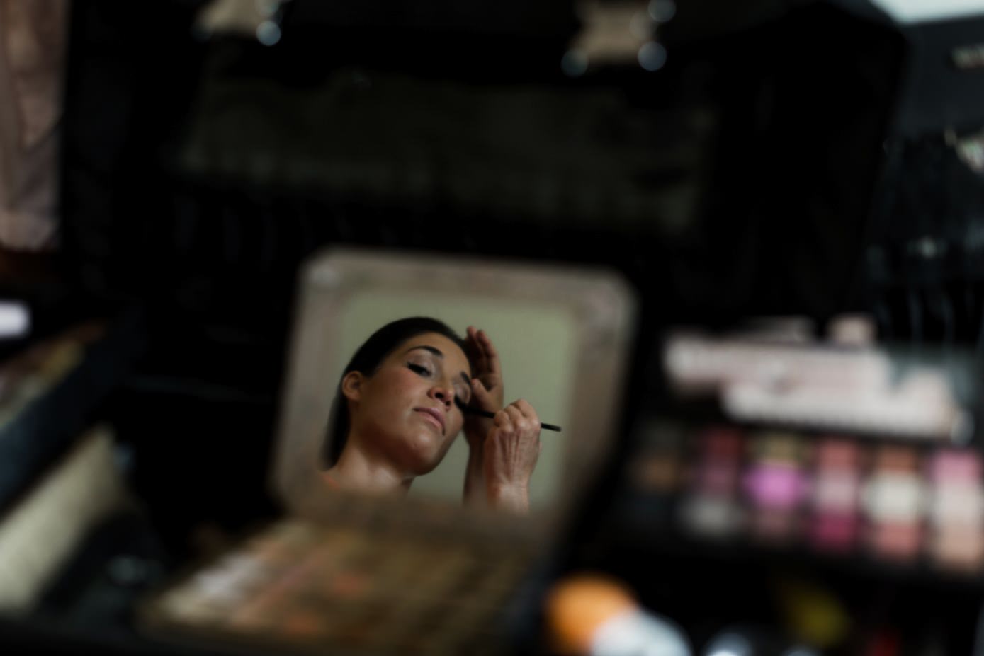 Bride getting hair and makeup done