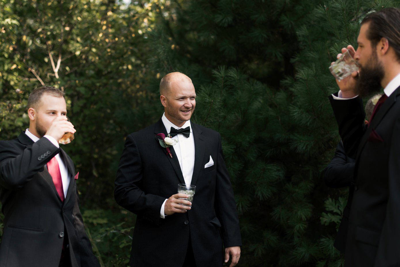 Groom hanging with groomsmen