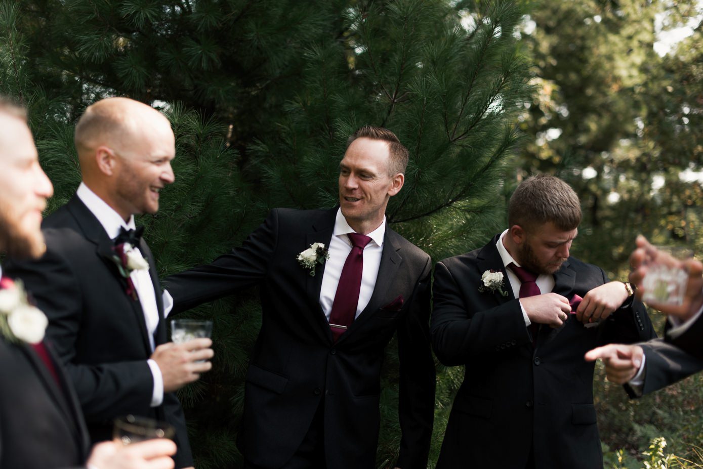 Groomsmen congratulating groom