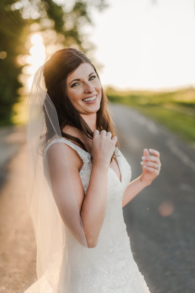Happy bride at Barn at Windy Pine.