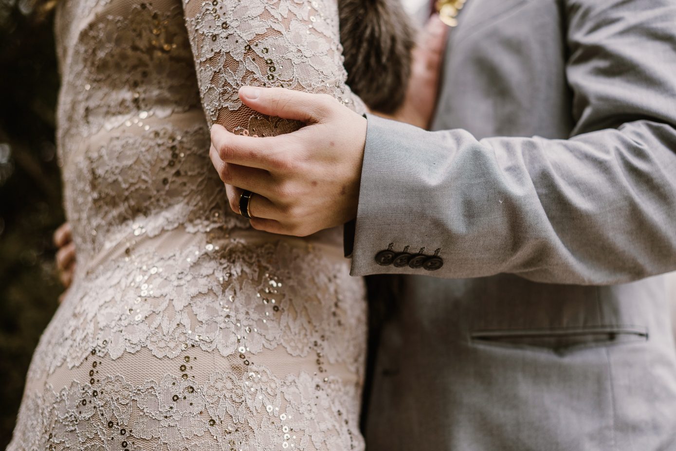 Groom holding bride