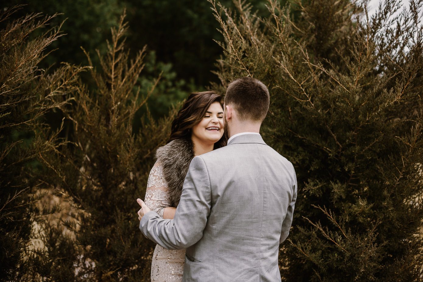 Bride and groom laughing together
