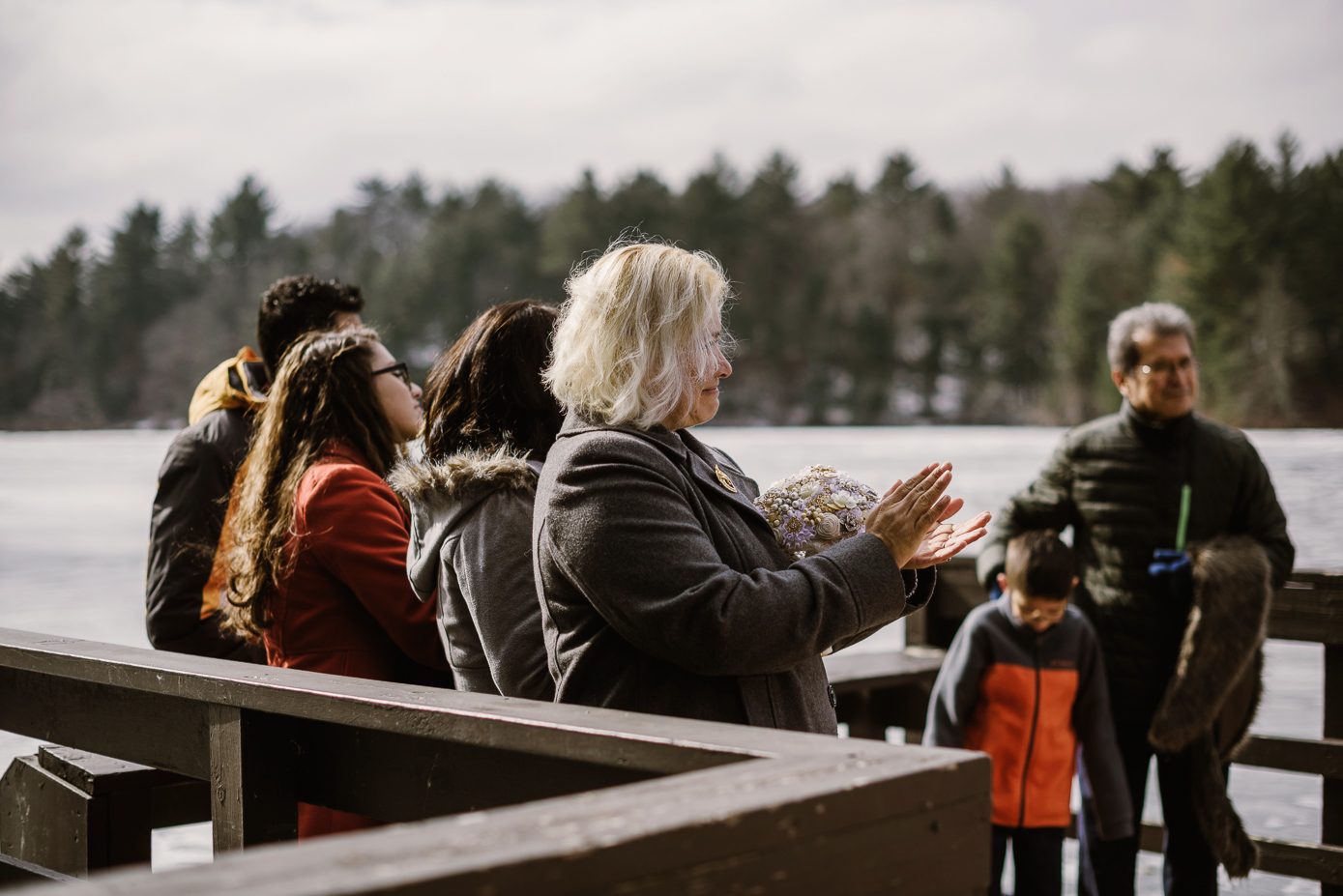 Bride's mother clapping