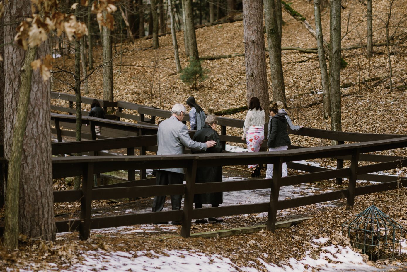 Wedding guests walking to ceremony site
