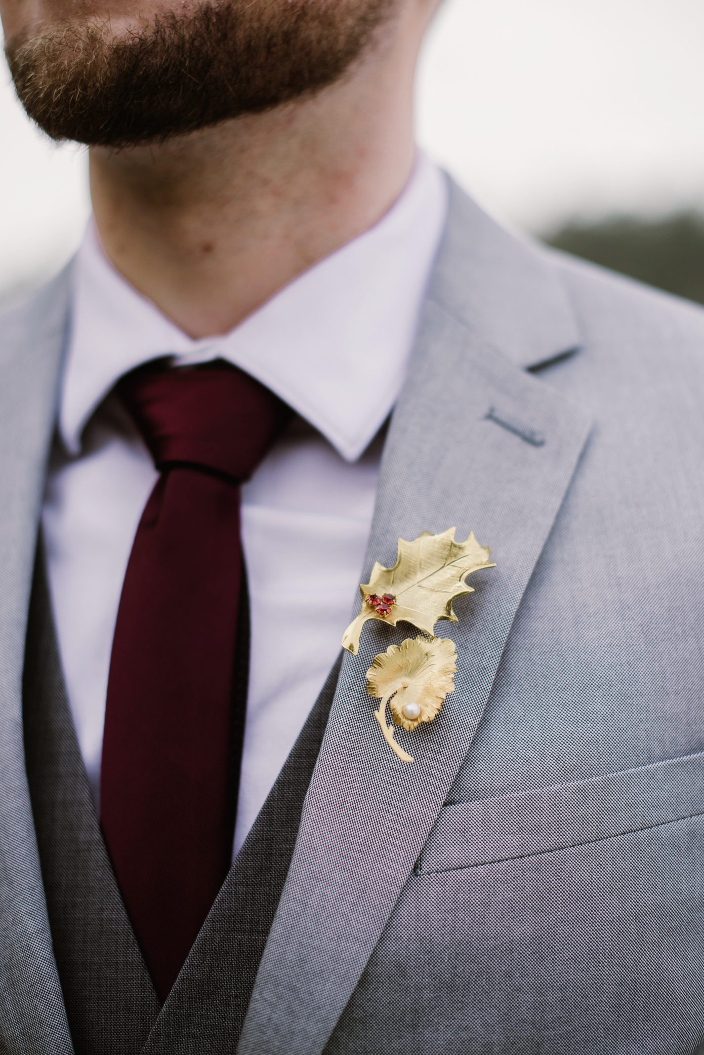 Gold leaf details on groom.