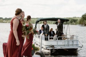 Groom arriving to ceremony on boat