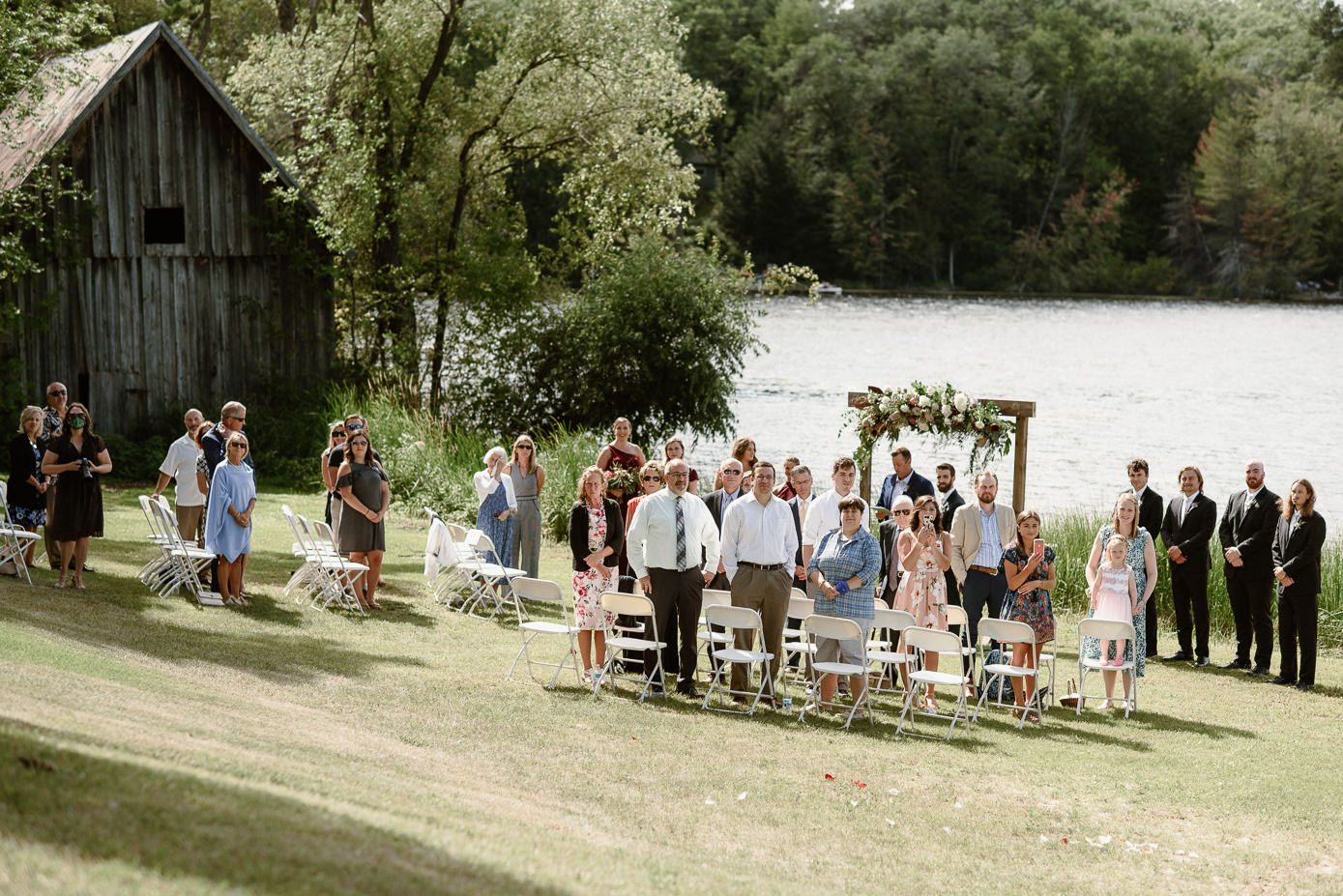 Guests at outdoor wedding ceremony