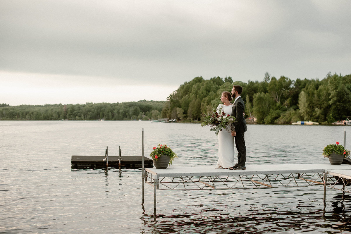 bride and groom on Gilas Lake in Pound WI