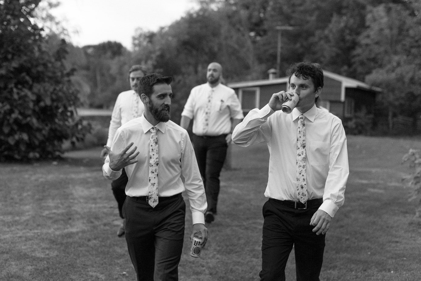 candid photo of groom with groomsmen