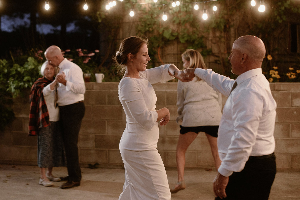 Bride dancing with father.