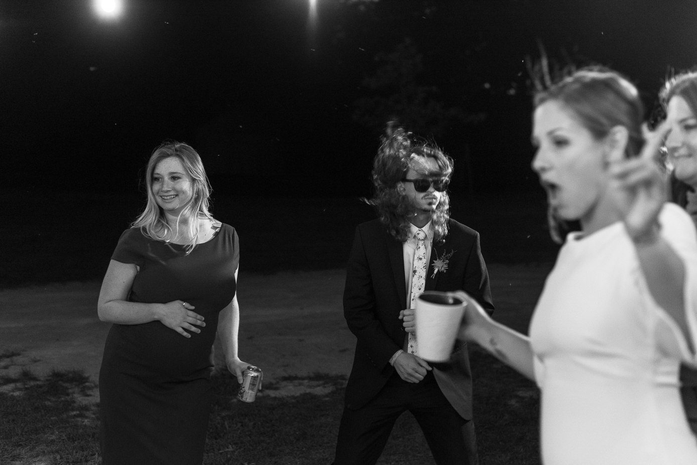 bridal party dancing at night
