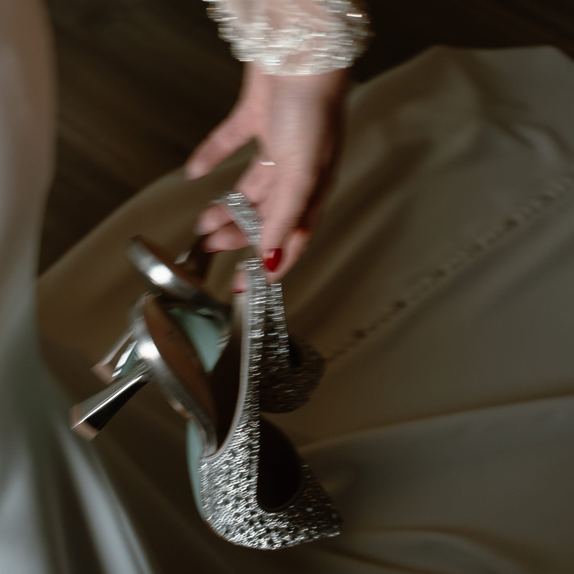 Bride holding Betsey Johnson shoes