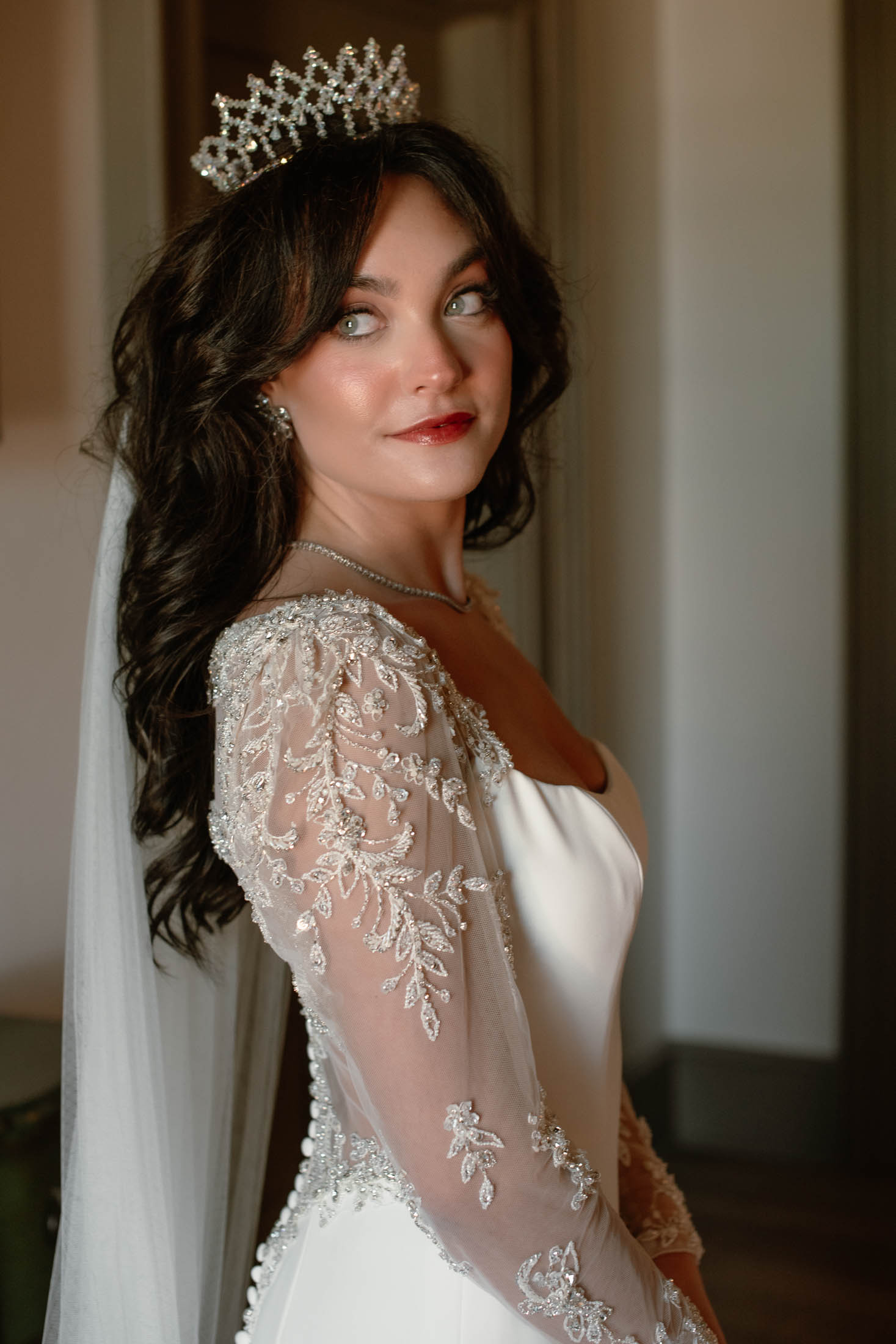 Portrait of edgy punk rock bride wearing a tiara paired with a veil.